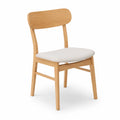 Chaise en bois de hêtre et tissu blanc